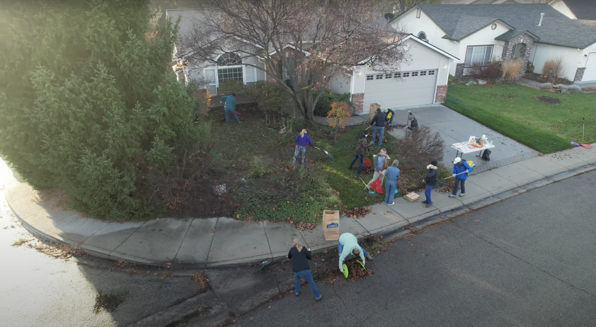 Photo of people raking