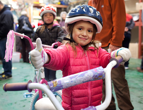 Little girl with bike