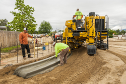 Photograph of people doing construction work