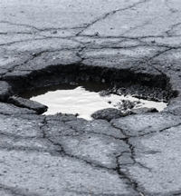 Pothole filled with water